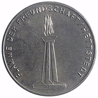 Medaille mit der Aufschrift "Flamme der Freundschaft / Hettstedt"